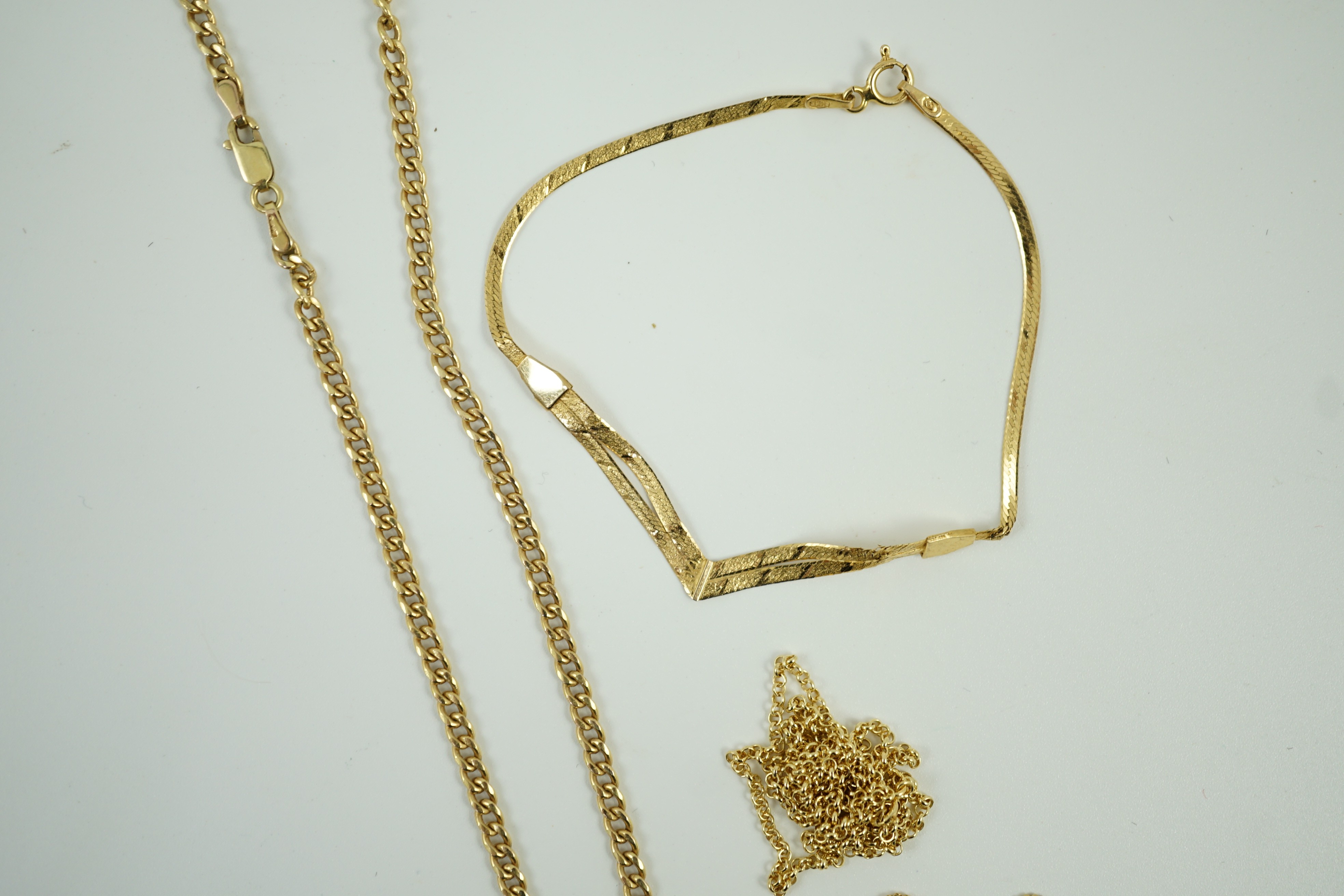 Two modern 9ct gold chains, longest 45cm, 6 grams, a 14kt bracelet, 1.6 grams and a 750 fine link chain, 2.3 grams.